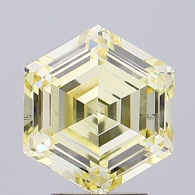 Loose Diamond - HEXAGONAL 3.1ct Fancy Yellow VS2: Loose Diamond - HEXAGONAL 3.1ct Fancy Yellow VS2 Source: This is a real non-mined Diamond that has been grown in a lab Shape: HEXAGONAL Carats: 3.1 Color: Fancy Yellow Certification: IGI Video: