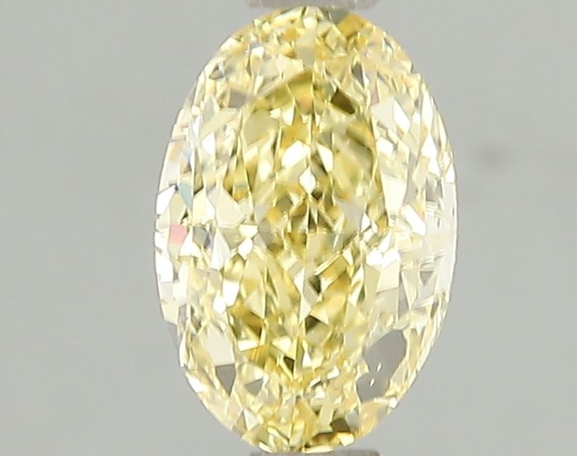 Loose Diamond - OVAL 1.52ct Fancy Intense Yellow VS2: Loose Diamond - OVAL 1.52ct Fancy Intense Yellow VS2 Source: This is a real non-mined Diamond that has been grown in a lab Shape: OVAL Carats: 1.52 Color: Fancy Intense Yellow Certification: IGI Video