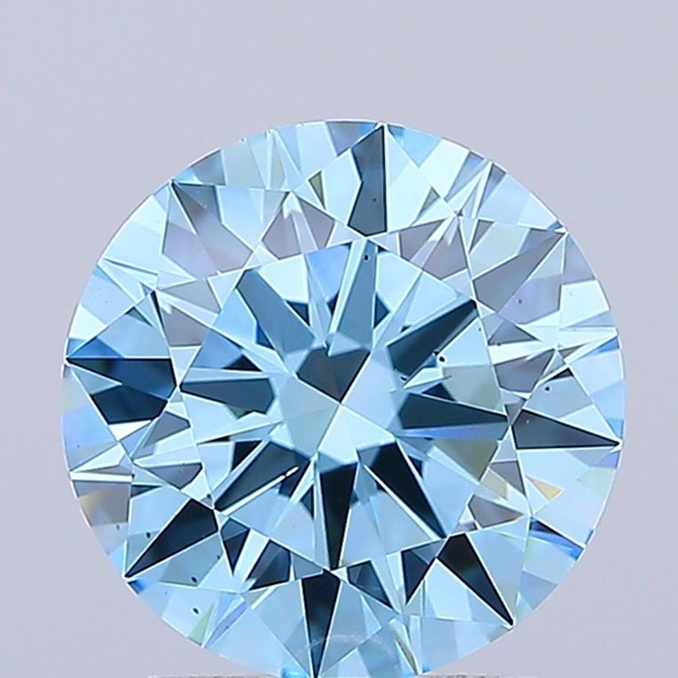 Ideal Loose Diamond - ROUND 2.3ct Fancy Vivid Blue VS2: Ideal Loose Diamond - ROUND 2.3ct Fancy Vivid Blue VS2 Source: This is a real non-mined Diamond that has been grown in a lab Shape: ROUND Carats: 2.3 Color: Fancy Vivid Blue Certification: IGI Video:
