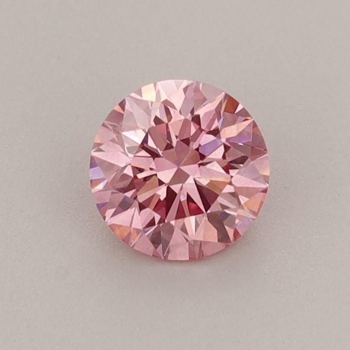 Loose Diamond - ROUND 0.48ct Fancy Vivid Pink VS2: Loose Diamond - ROUND 0.48ct Fancy Vivid Pink VS2 Source: This is a real non-mined Diamond that has been grown in a lab Shape: ROUND Carats: 0.48 Color: Fancy Vivid Pink Certification: IGI Video: