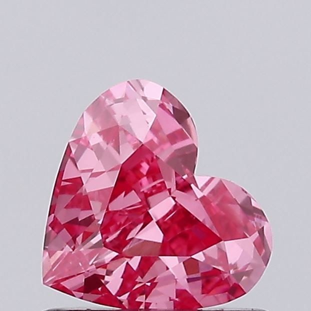 Loose Diamond - HEART 0.56ct Fancy Vivid Pink VS1: Loose Diamond - HEART 0.56ct Fancy Vivid Pink VS1 Source: This is a real non-mined Diamond that has been grown in a lab Shape: HEART Carats: 0.56 Color: Fancy Vivid Pink Certification: IGI Video: