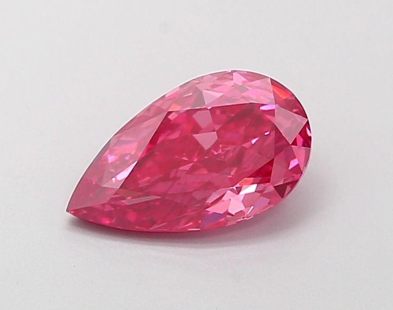 Loose Diamond - PEAR 1.33ct Fancy Vivid Pink SI1: Loose Diamond - PEAR 1.33ct Fancy Vivid Pink SI1 Source: This is a real non-mined Diamond that has been grown in a lab Shape: PEAR Carats: 1.33 Color: Fancy Vivid Pink Certification: IGI Video: