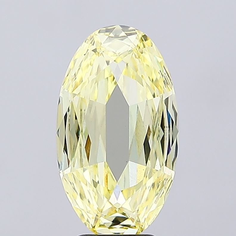 Loose Diamond - OVAL 4.1ct Fancy Yellow VS1: Loose Diamond - OVAL 4.1ct Fancy Yellow VS1 Source: This is a real non-mined Diamond that has been grown in a lab Shape: OVAL Carats: 4.1 Color: Fancy Yellow Certification: IGI Video: