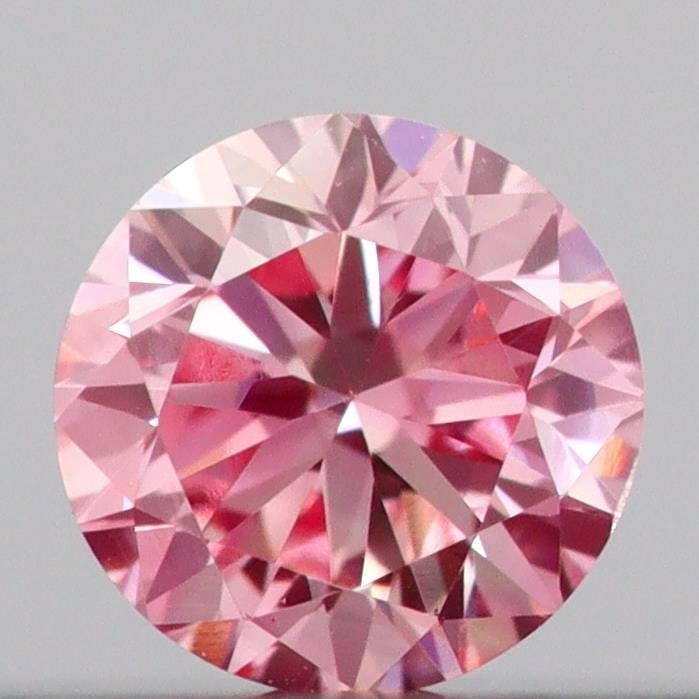 Loose Diamond - ROUND 0.15ct Fancy Vivid Pink VVS2: Loose Diamond - ROUND 0.15ct Fancy Vivid Pink VVS2 Source: This is a real non-mined Diamond that has been grown in a lab Shape: ROUND Carats: 0.15 Color: Fancy Vivid Pink Certification: IGI Video: