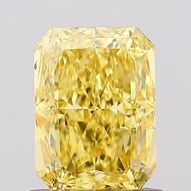 Loose Diamond - RADIANT 1.02ct Fancy Vivid Yellow SI1: Loose Diamond - RADIANT 1.02ct Fancy Vivid Yellow SI1 Source: This is a real non-mined Diamond that has been grown in a lab Shape: RADIANT Carats: 1.02 Color: Fancy Vivid Yellow Certification: IGI Vid