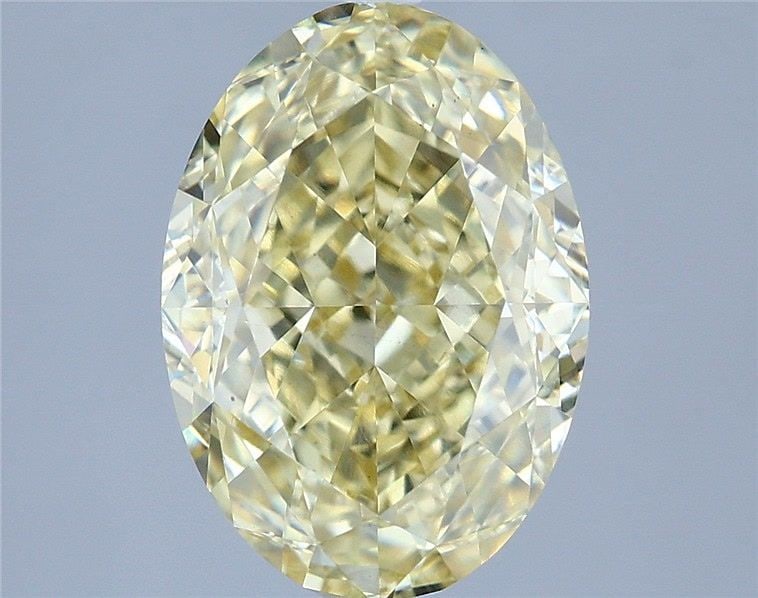 Loose Diamond - OVAL 3.05ct Fancy Yellow VS2: Loose Diamond - OVAL 3.05ct Fancy Yellow VS2 Source: This is a real non-mined Diamond that has been grown in a lab Shape: OVAL Carats: 3.05 Color: Fancy Yellow Certification: IGI Video: