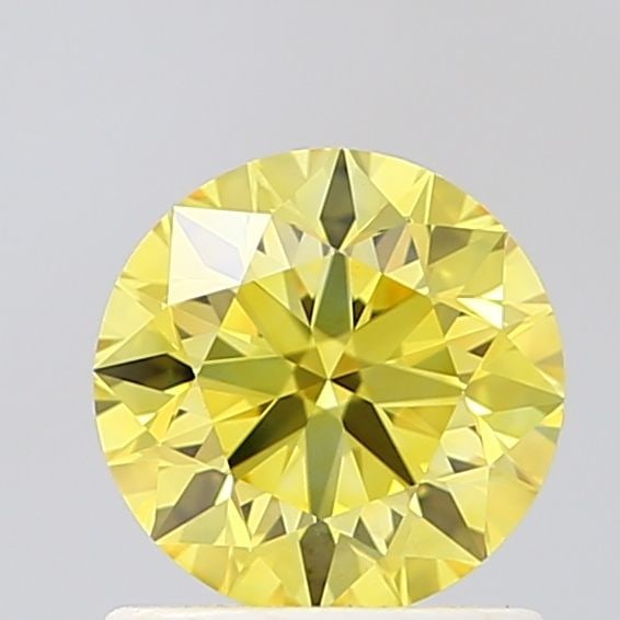 Loose Diamond - ROUND 1.04ct Fancy Vivid Yellow VVS2: Loose Diamond - ROUND 1.04ct Fancy Vivid Yellow VVS2 Source: This is a real non-mined Diamond that has been grown in a lab Shape: ROUND Carats: 1.04 Color: Fancy Vivid Yellow Certification: IGI Video: