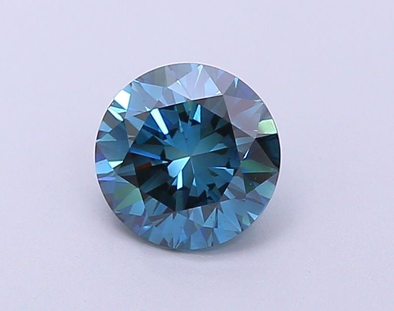 Loose Diamond - ROUND 0.65ct Fancy Blue SI1: Loose Diamond - ROUND 0.65ct Fancy Blue SI1 Source: This is a real non-mined Diamond that has been grown in a lab Shape: ROUND Carats: 0.65 Color: Fancy Blue Certification: NONE Video: