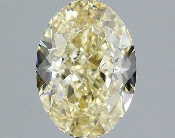 Loose Diamond - OVAL 1.86ct Fancy Yellow VVS2: Loose Diamond - OVAL 1.86ct Fancy Yellow VVS2 Source: This is a real non-mined Diamond that has been grown in a lab Shape: OVAL Carats: 1.86 Color: Fancy Yellow Certification: IGI Video: