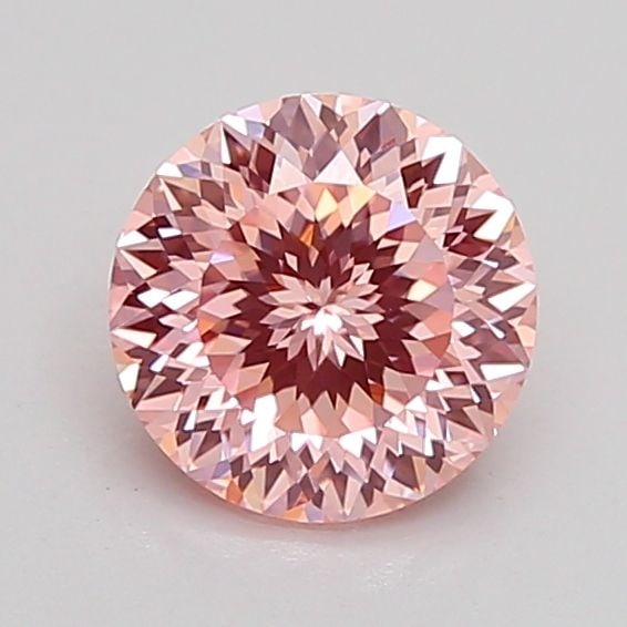 Loose Diamond - ROUND 1.1ct Fancy Intense Pink VVS2: Loose Diamond - ROUND 1.1ct Fancy Intense Pink VVS2 Source: This is a real non-mined Diamond that has been grown in a lab Shape: ROUND Carats: 1.1 Color: Fancy Intense Pink Certification: IGI Video: