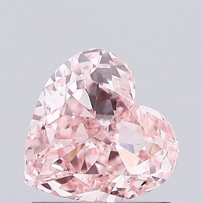 Loose Diamond - HEART 0.84ct Fancy Intense Pink VS1: Loose Diamond - HEART 0.84ct Fancy Intense Pink VS1 Source: This is a real non-mined Diamond that has been grown in a lab Shape: HEART Carats: 0.84 Color: Fancy Intense Pink Certification: IGI Video:
