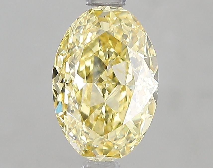 Loose Diamond - OVAL 1.59ct Fancy Intense Yellow VS1: Loose Diamond - OVAL 1.59ct Fancy Intense Yellow VS1 Source: This is a real non-mined Diamond that has been grown in a lab Shape: OVAL Carats: 1.59 Color: Fancy Intense Yellow Certification: IGI Video