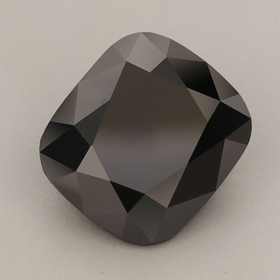 Loose Diamond - CUSHION MODIFIED 2.51ct Fancy Black: Loose Diamond - CUSHION MODIFIED 2.51ct Fancy Black Source: This is a real non-mined Diamond that has been grown in a lab Shape: CUSHION MODIFIED Carats: 2.51 Color: Fancy Black Certification: IGI Vid