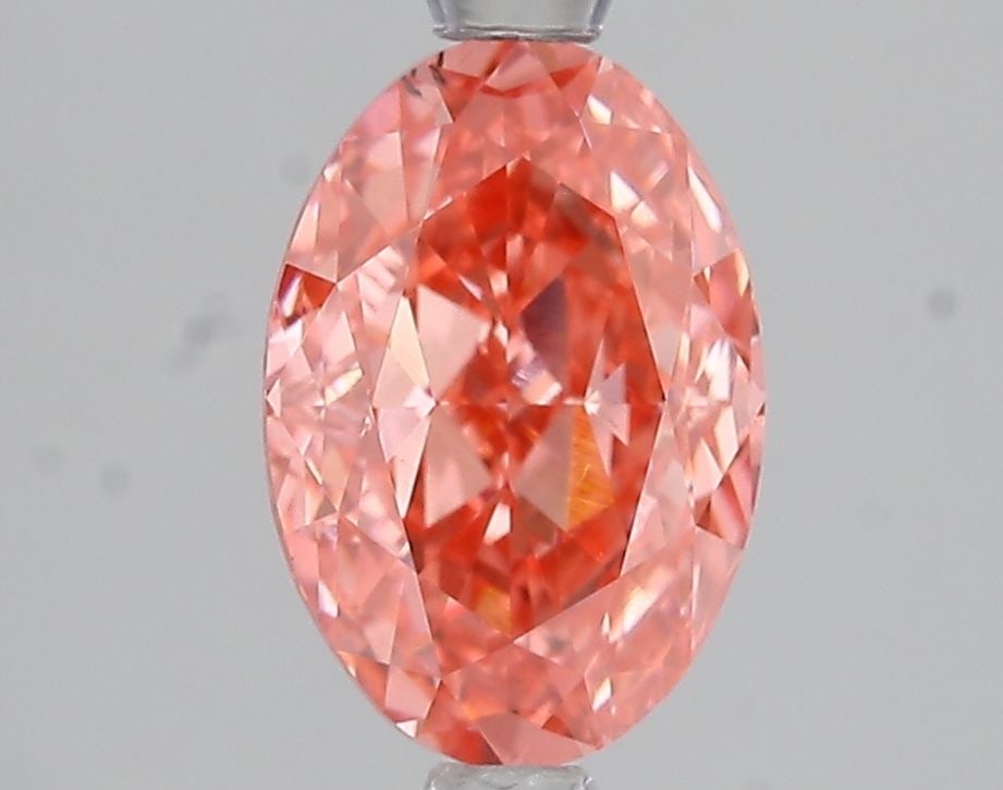 Loose Diamond - OVAL 2.08ct Fancy Vivid Pink VS2: Loose Diamond - OVAL 2.08ct Fancy Vivid Pink VS2 Source: This is a real non-mined Diamond that has been grown in a lab Shape: OVAL Carats: 2.08 Color: Fancy Vivid Pink Certification: IGI Video: