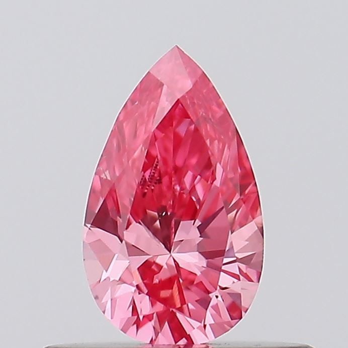 Loose Diamond - PEAR 0.34ct Fancy Vivid Pink VS2: Loose Diamond - PEAR 0.34ct Fancy Vivid Pink VS2 Source: This is a real non-mined Diamond that has been grown in a lab Shape: PEAR Carats: 0.34 Color: Fancy Vivid Pink Certification: IGI Video: