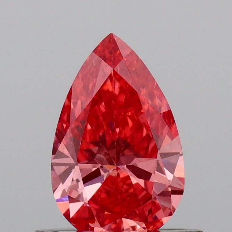 Loose Diamond - PEAR 0.55ct Fancy Vivid Pink VVS2: Loose Diamond - PEAR 0.55ct Fancy Vivid Pink VVS2 Source: This is a real non-mined Diamond that has been grown in a lab Shape: PEAR Carats: 0.55 Color: Fancy Vivid Pink Certification: IGI Video: