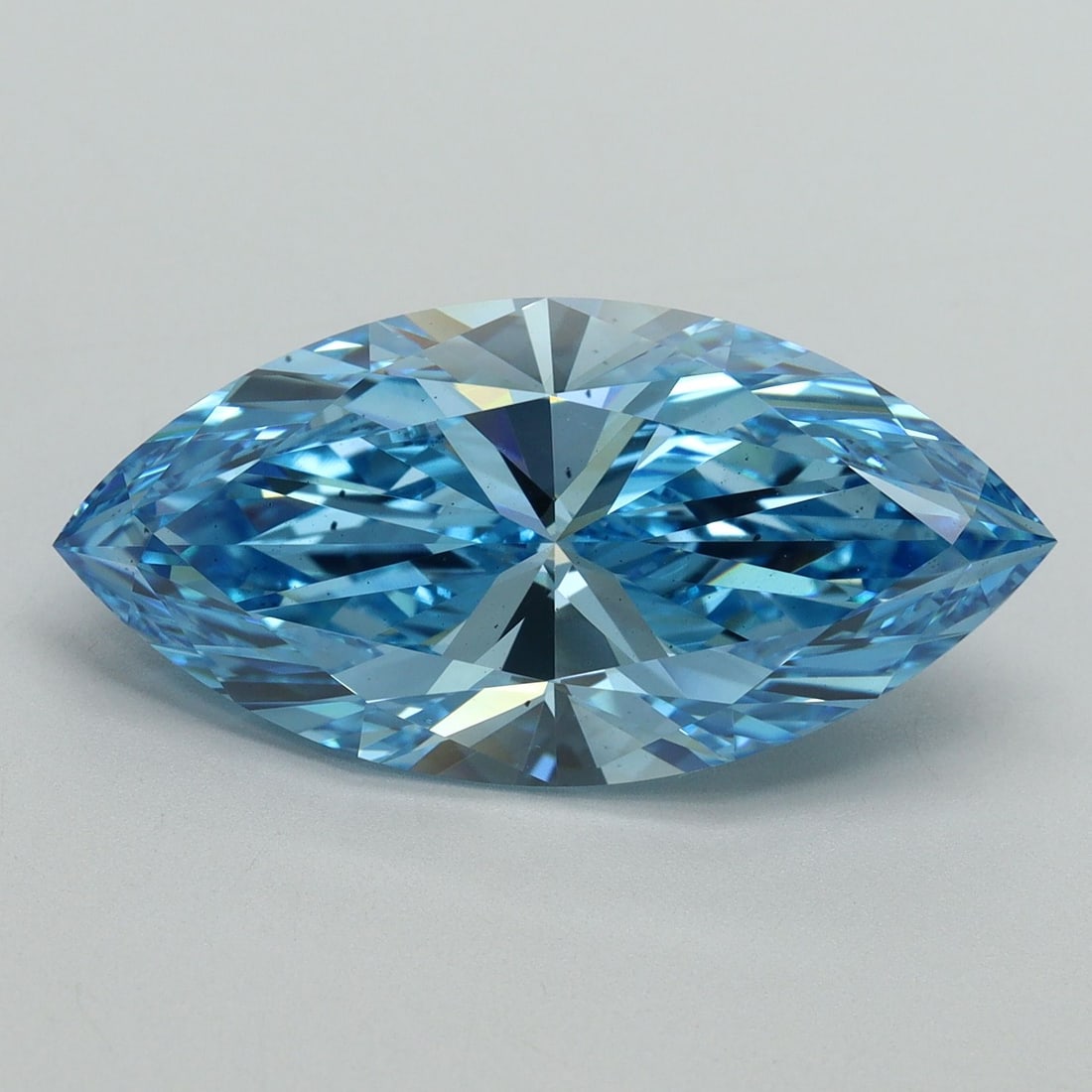 Loose Diamond - MARQUISE 7.01ct Fancy Vivid Blue VS2: Loose Diamond - MARQUISE 7.01ct Fancy Vivid Blue VS2 Source: This is a real non-mined Diamond that has been grown in a lab Shape: MARQUISE Carats: 7.01 Color: Fancy Vivid Blue Certification: IGI Video