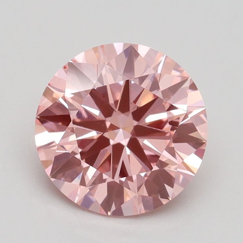 Ideal Loose Diamond - ROUND 1.83ct Fancy Vivid Pink VS1: Ideal Loose Diamond - ROUND 1.83ct Fancy Vivid Pink VS1 Source: This is a real non-mined Diamond that has been grown in a lab Shape: ROUND Carats: 1.83 Color: Fancy Vivid Pink Certification: IGI Video