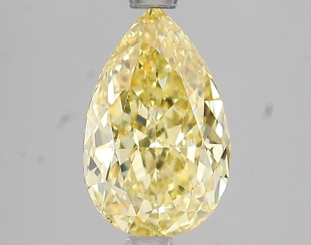 Loose Diamond - PEAR 2.51ct Fancy Vivid Yellow VS2: Loose Diamond - PEAR 2.51ct Fancy Vivid Yellow VS2 Source: This is a real non-mined Diamond that has been grown in a lab Shape: PEAR Carats: 2.51 Color: Fancy Vivid Yellow Certification: IGI Video:
