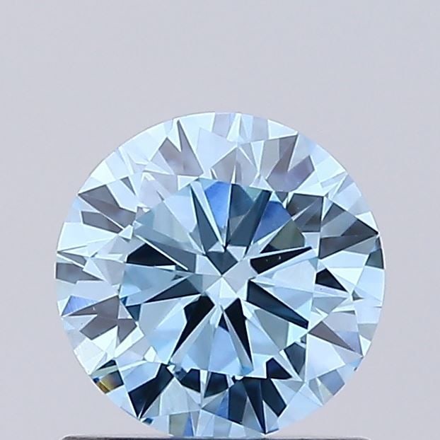 Loose Diamond - ROUND 0.73ct Fancy Vivid Blue VS1: Loose Diamond - ROUND 0.73ct Fancy Vivid Blue VS1 Source: This is a real non-mined Diamond that has been grown in a lab Shape: ROUND Carats: 0.73 Color: Fancy Vivid Blue Certification: IGI Video: