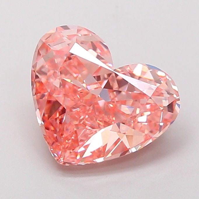 Loose Diamond - HEART 3.1ct Fancy Vivid Pink VS1: Loose Diamond - HEART 3.1ct Fancy Vivid Pink VS1 Source: This is a real non-mined Diamond that has been grown in a lab Shape: HEART Carats: 3.1 Color: Fancy Vivid Pink Certification: IGI Additional im