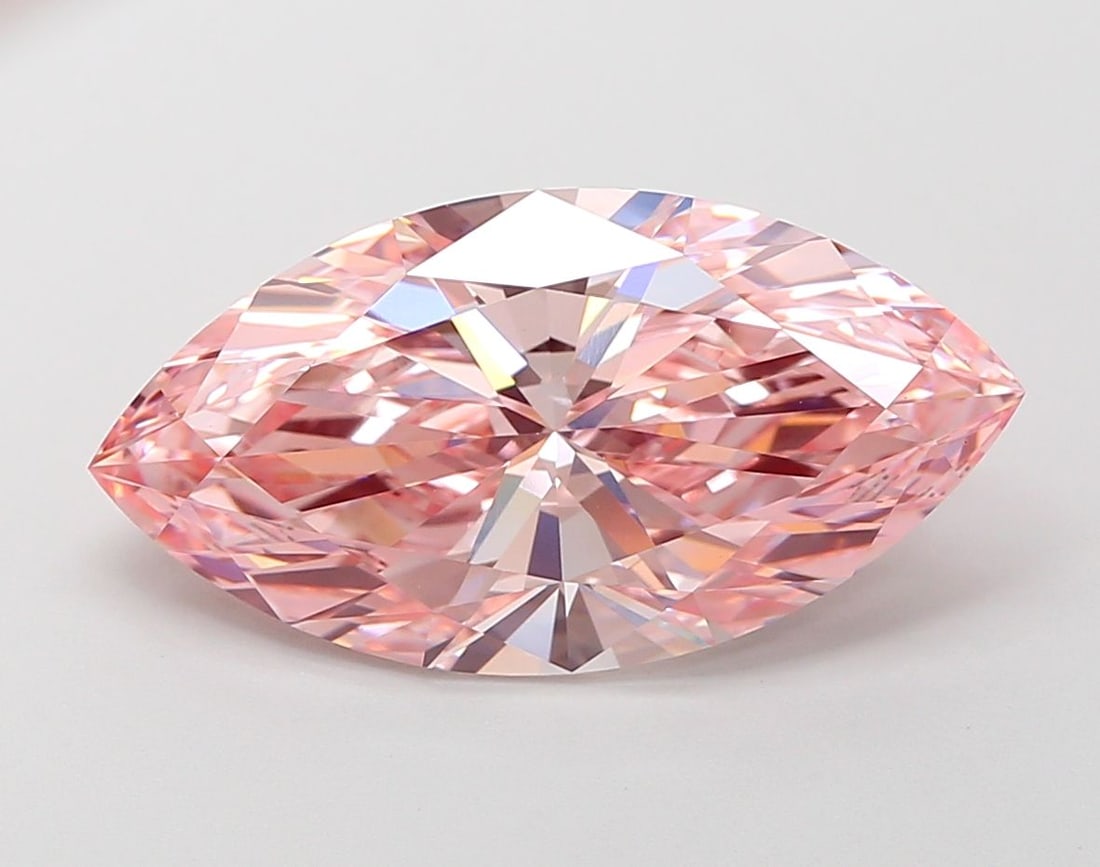 Loose Diamond - MARQUISE 6.14ct Fancy Vivid Pink VVS2: Loose Diamond - MARQUISE 6.14ct Fancy Vivid Pink VVS2 Source: This is a real non-mined Diamond that has been grown in a lab Shape: MARQUISE Carats: 6.14 Color: Fancy Vivid Pink Certification: IGI Vide