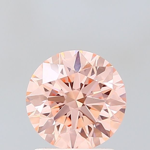 Ideal Loose Diamond - ROUND 1.55ct Fancy Vivid Pink VVS2: Ideal Loose Diamond - ROUND 1.55ct Fancy Vivid Pink VVS2 Source: This is a real non-mined Diamond that has been grown in a lab Shape: ROUND Carats: 1.55 Color: Fancy Vivid Pink Certification: IGI Vide