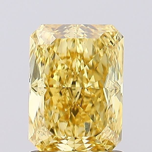 Loose Diamond - RADIANT 1.31ct Fancy Vivid Yellow VS1: Loose Diamond - RADIANT 1.31ct Fancy Vivid Yellow VS1 Source: This is a real non-mined Diamond that has been grown in a lab Shape: RADIANT Carats: 1.31 Color: Fancy Vivid Yellow Certification: IGI Vid