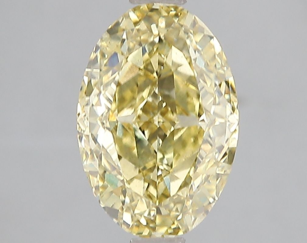 Loose Diamond - OVAL 3.01ct Fancy Intense Yellow VS2: Loose Diamond - OVAL 3.01ct Fancy Intense Yellow VS2 Source: This is a real non-mined Diamond that has been grown in a lab Shape: OVAL Carats: 3.01 Color: Fancy Intense Yellow Certification: IGI