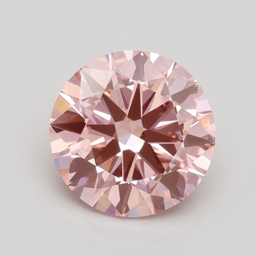 Loose Diamond - ROUND 1.7ct Fancy Vivid Pink VS2: Loose Diamond - ROUND 1.7ct Fancy Vivid Pink VS2 Source: This is a real non-mined Diamond that has been grown in a lab Shape: ROUND Carats: 1.7 Color: Fancy Vivid Pink Certification: IGI Video: Video