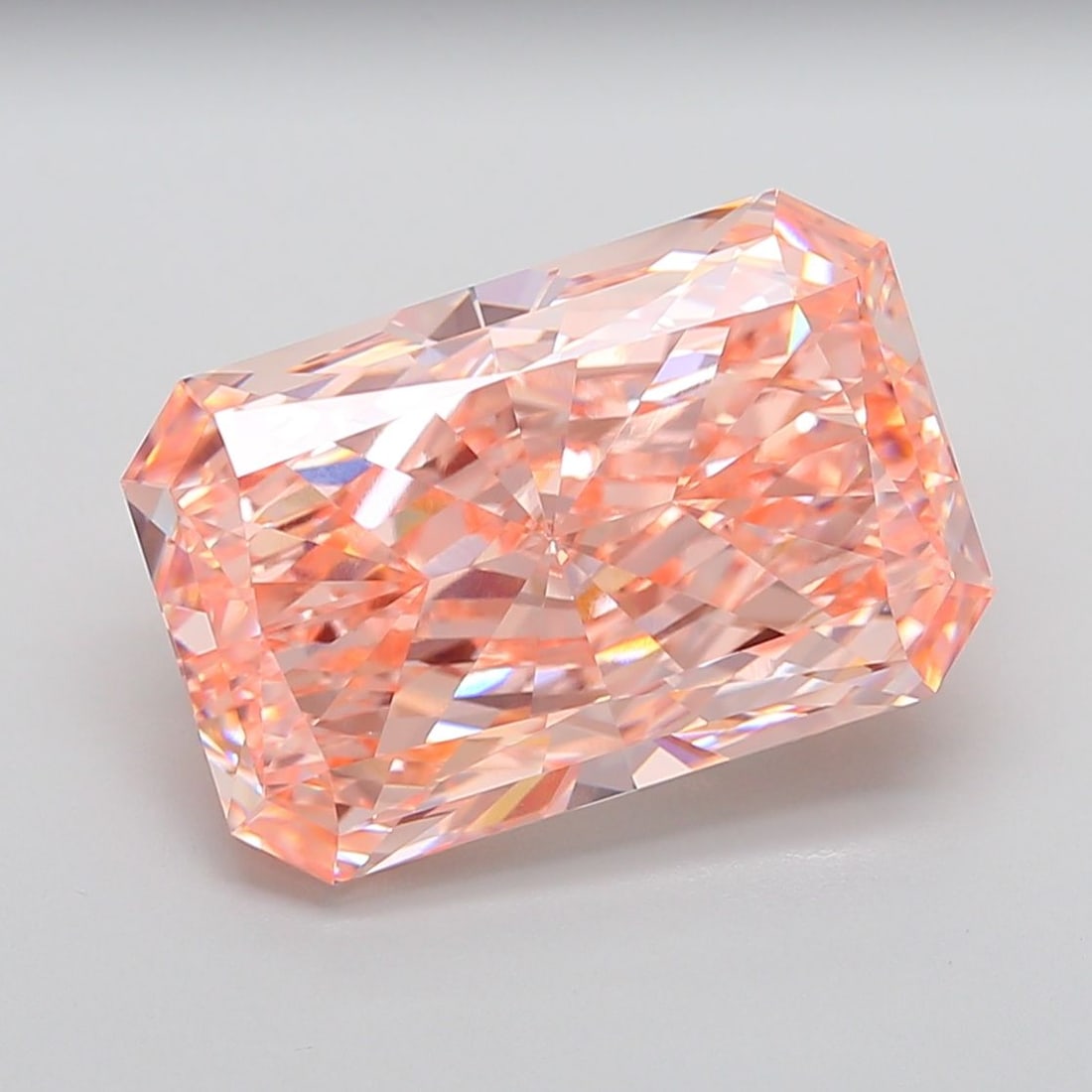 Loose Diamond - RADIANT 14.09ct Fancy Vivid Pink VVS2: Loose Diamond - RADIANT 14.09ct Fancy Vivid Pink VVS2 Source: This is a real non-mined Diamond that has been grown in a lab Shape: RADIANT Carats: 14.09 Color: Fancy Vivid Pink Certification: IGI Addi