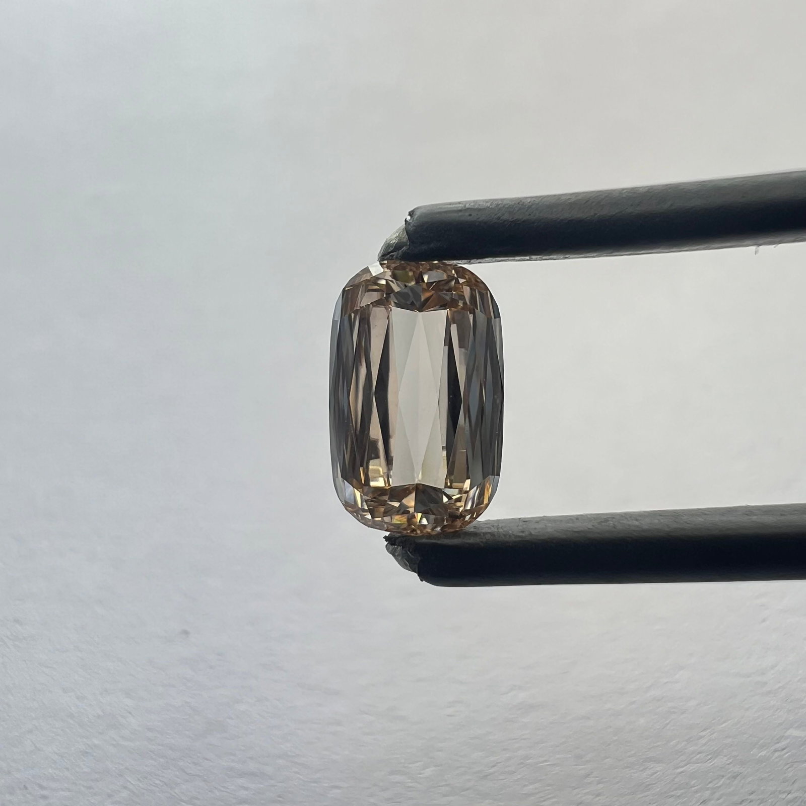 Loose Diamond - OTHER 0.97ct Champagne VVS2: Loose Diamond - OTHER 0.97ct Champagne VVS2 Source: This is a real non-mined Diamond that has been grown in a lab Shape: OTHER Carats: 0.97 Color: Champagne Certification: NONE Additional images avail