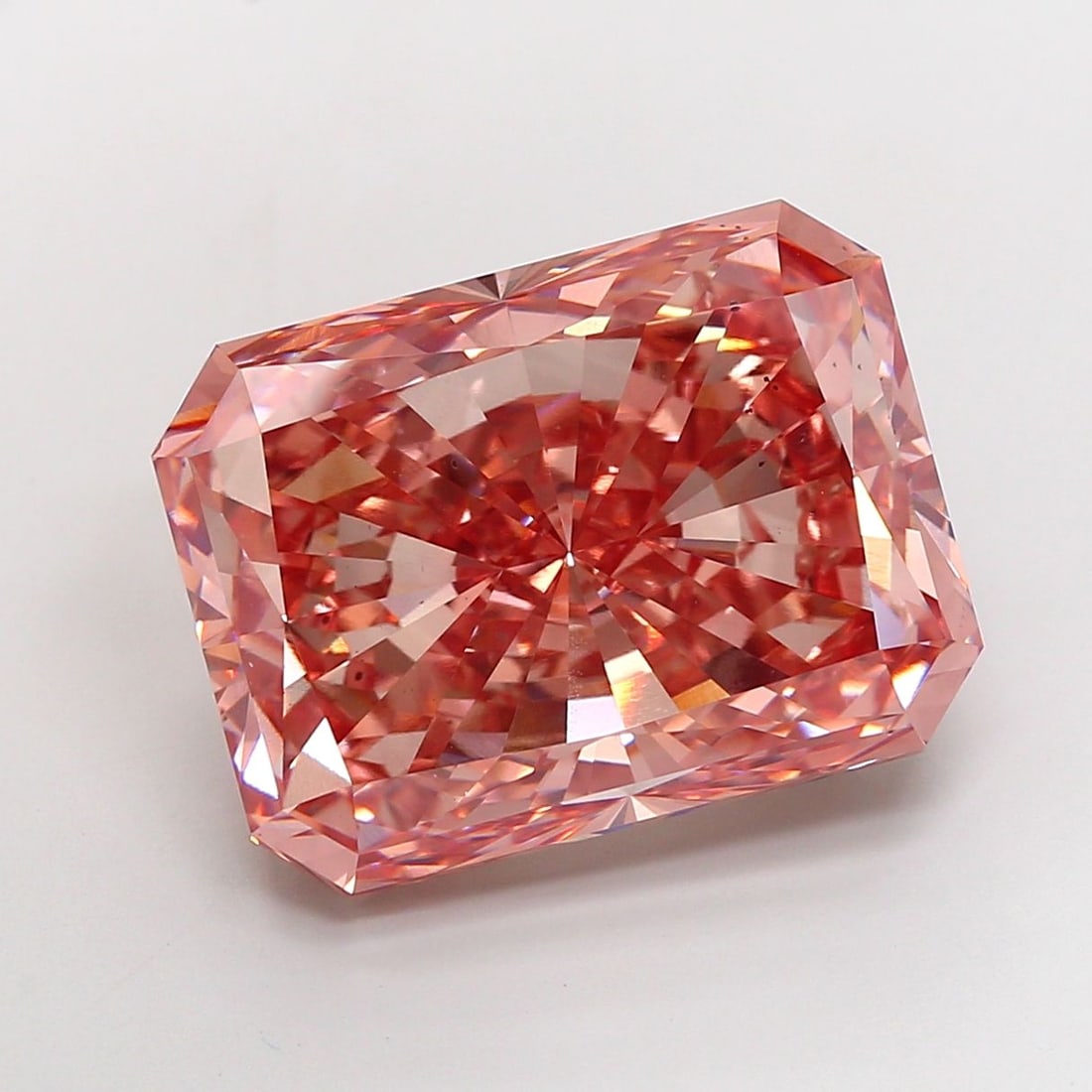 Loose Diamond - RADIANT 25.11ct Fancy Vivid Pink VS2: Loose Diamond - RADIANT 25.11ct Fancy Vivid Pink VS2 Source: This is a real non-mined Diamond that has been grown in a lab Shape: RADIANT Carats: 25.11 Color: Fancy Vivid Pink Certification: IGI Video