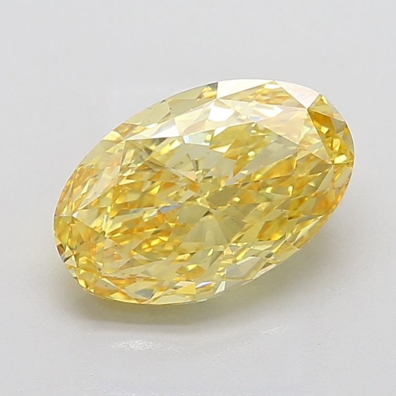 Loose Diamond - OVAL 5.01ct Fancy Vivid Yellow VS2: Loose Diamond - OVAL 5.01ct Fancy Vivid Yellow VS2 Source: This is a real non-mined Diamond that has been grown in a lab Shape: OVAL Carats: 5.01 Color: Fancy Vivid Yellow Certification: IGI Video: