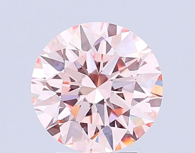 Ideal Loose Diamond - ROUND 3.04ct Fancy Light Orangey Pink VS1: Ideal Loose Diamond - ROUND 3.04ct Fancy Light Orangey Pink VS1 Source: This is a real non-mined Diamond that has been grown in a lab Shape: ROUND Carats: 3.04 Color: Fancy Light Orangey Pink Certific