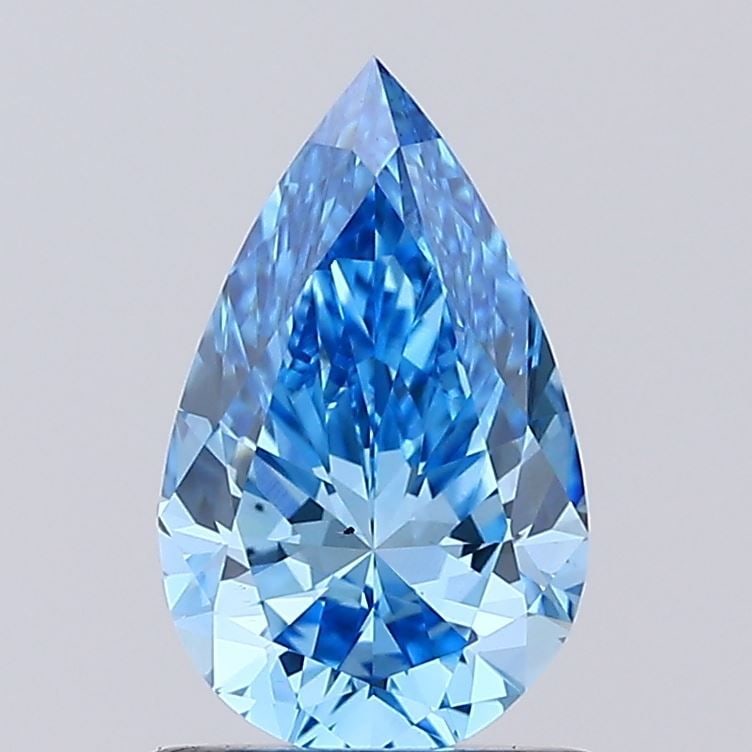 Loose Diamond - PEAR 1.01ct Fancy Vivid Blue VS2: Loose Diamond - PEAR 1.01ct Fancy Vivid Blue VS2 Source: This is a real non-mined Diamond that has been grown in a lab Shape: PEAR Carats: 1.01 Color: Fancy Vivid Blue Certification: IGI Video: