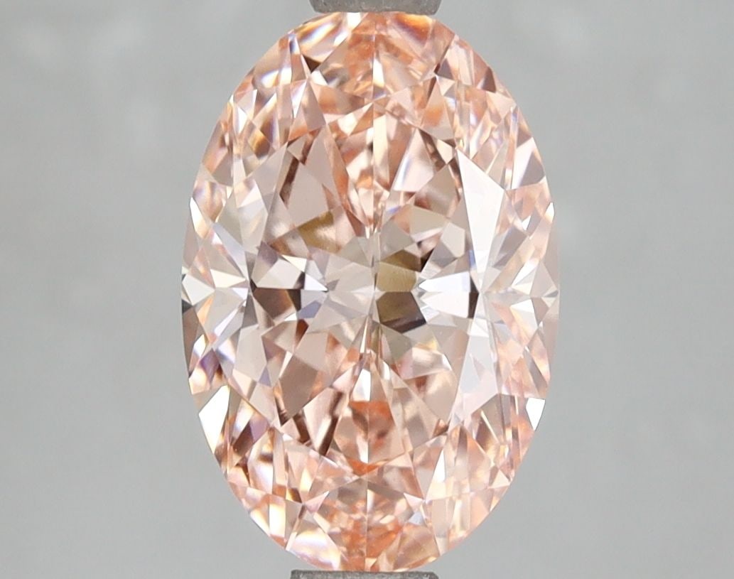 Loose Diamond - OVAL 2.41ct Fancy Vivid Pink VVS2: Loose Diamond - OVAL 2.41ct Fancy Vivid Pink VVS2 Source: This is a real non-mined Diamond that has been grown in a lab Shape: OVAL Carats: 2.41 Color: Fancy Vivid Pink Certification: IGI Video: