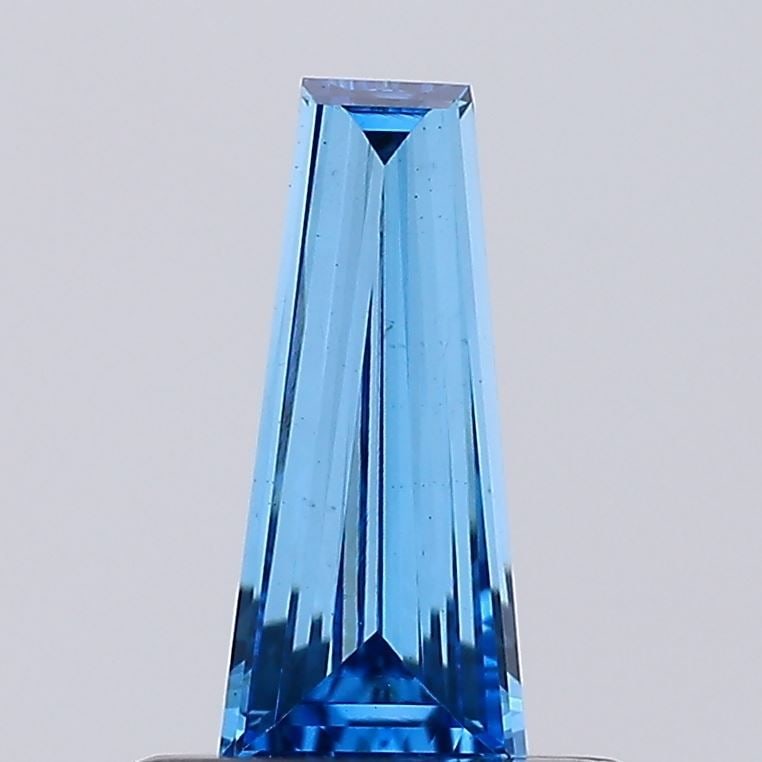 Loose Diamond - BAGUETTE 0.33ct Fancy Vivid Blue VS1: Loose Diamond - BAGUETTE 0.33ct Fancy Vivid Blue VS1 Source: This is a real non-mined Diamond that has been grown in a lab Shape: BAGUETTE Carats: 0.33 Color: Fancy Vivid Blue Certification: NONE Vide