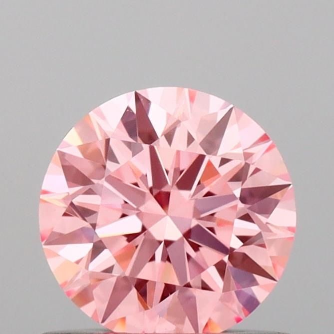 Ideal Loose Diamond - ROUND 0.65ct Fancy Vivid Pink VVS2: Ideal Loose Diamond - ROUND 0.65ct Fancy Vivid Pink VVS2 Source: This is a real non-mined Diamond that has been grown in a lab Shape: ROUND Carats: 0.65 Color: Fancy Vivid Pink Certification: IGI Vide