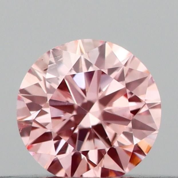 Loose Diamond - ROUND 0.21ct Fancy Vivid Pink SI1: Loose Diamond - ROUND 0.21ct Fancy Vivid Pink SI1 Source: This is a real non-mined Diamond that has been grown in a lab Shape: ROUND Carats: 0.21 Color: Fancy Vivid Pink Certification: IGI Video: