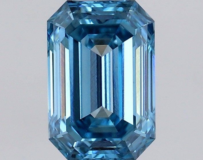 Loose Diamond - EMERALD 0.57ct Fancy Vivid Blue VS1: Loose Diamond - EMERALD 0.57ct Fancy Vivid Blue VS1 Source: This is a real non-mined Diamond that has been grown in a lab Shape: EMERALD Carats: 0.57 Color: Fancy Vivid Blue Certification: IGI Video: