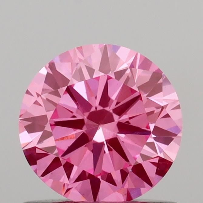 Loose Diamond - ROUND 0.71ct Fancy Vivid Pink VS1: Loose Diamond - ROUND 0.71ct Fancy Vivid Pink VS1 Source: This is a real non-mined Diamond that has been grown in a lab Shape: ROUND Carats: 0.71 Color: Fancy Vivid Pink Certification: IGI Video: