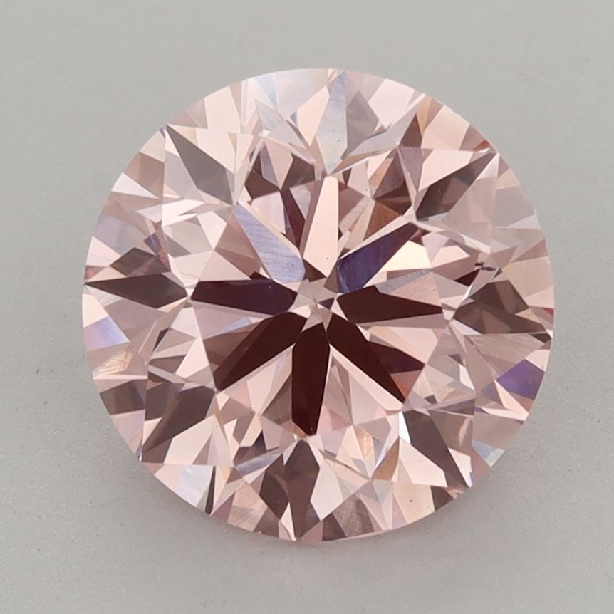 Loose Diamond - ROUND 3.15ct Fancy Vivid Pink VS2: Loose Diamond - ROUND 3.15ct Fancy Vivid Pink VS2 Source: This is a real non-mined Diamond that has been grown in a lab Shape: ROUND Carats: 3.15 Color: Fancy Vivid Pink Certification: IGI Video: