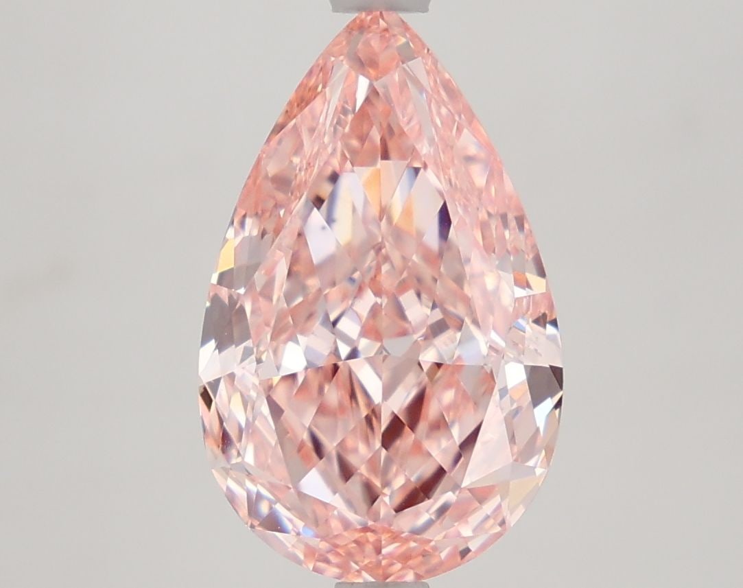 Loose Diamond - PEAR 4.05ct Fancy Vivid Pink VS1: Loose Diamond - PEAR 4.05ct Fancy Vivid Pink VS1 Source: This is a real non-mined Diamond that has been grown in a lab Shape: PEAR Carats: 4.05 Color: Fancy Vivid Pink Certification: IGI Video: