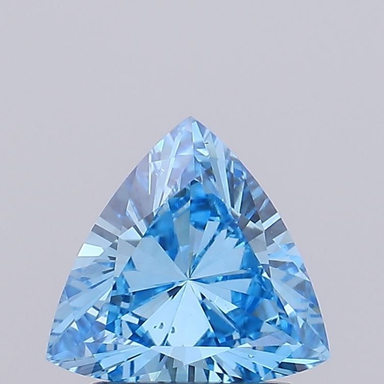 Loose Diamond - TRIANGULAR 1.12ct Fancy Vivid Blue VS2: Loose Diamond - TRIANGULAR 1.12ct Fancy Vivid Blue VS2 Source: This is a real non-mined Diamond that has been grown in a lab Shape: TRIANGULAR Carats: 1.12 Color: Fancy Vivid Blue Certification: IGI V