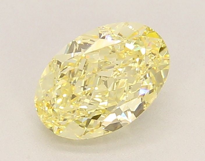 Loose Diamond - OVAL 1.35ct Fancy Yellow VVS2: Loose Diamond - OVAL 1.35ct Fancy Yellow VVS2 Source: This is a real non-mined Diamond that has been grown in a lab Shape: OVAL Carats: 1.35 Color: Fancy Yellow Certification: IGI Video: