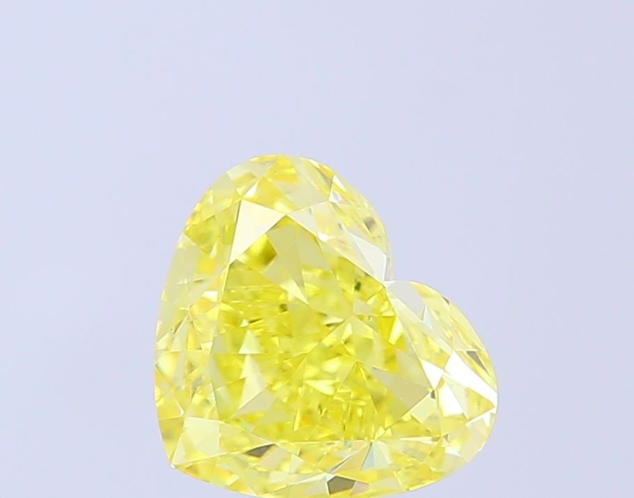 Loose Diamond - HEART 3.04ct Fancy Vivid Yellow VVS2: Loose Diamond - HEART 3.04ct Fancy Vivid Yellow VVS2 Source: This is a real non-mined Diamond that has been grown in a lab Shape: HEART Carats: 3.04 Color: Fancy Vivid Yellow Certification: IGI Video: