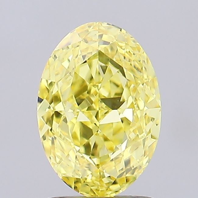 Loose Diamond - OVAL 1.7ct Fancy Vivid Yellow VS1: Loose Diamond - OVAL 1.7ct Fancy Vivid Yellow VS1 Source: This is a real non-mined Diamond that has been grown in a lab Shape: OVAL Carats: 1.7 Color: Fancy Vivid Yellow Certification: IGI Video: