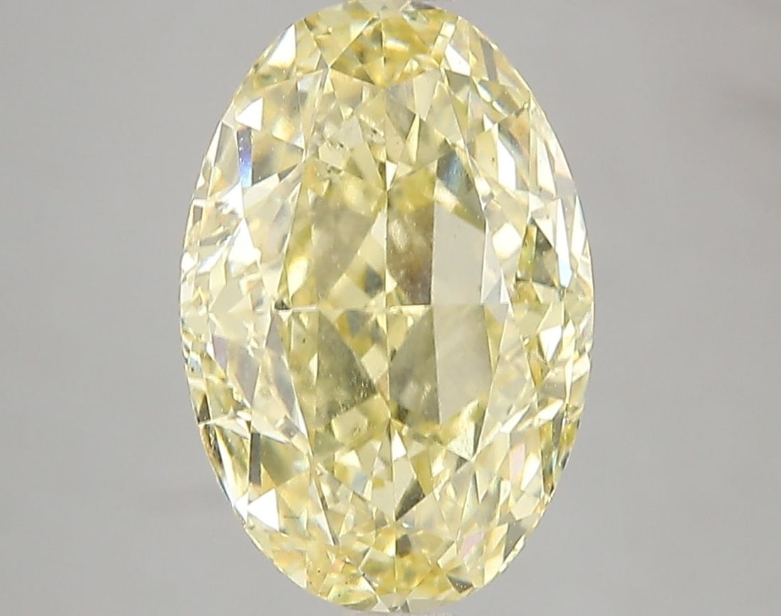 Loose Diamond - OVAL 5.03ct Fancy Intense Yellow SI1: Loose Diamond - OVAL 5.03ct Fancy Intense Yellow SI1 Source: This is a real non-mined Diamond that has been grown in a lab Shape: OVAL Carats: 5.03 Color: Fancy Intense Yellow Certification: IGI Video