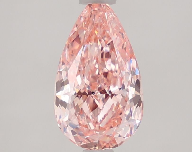 Loose Diamond - PEAR 1.56ct Fancy Vivid Pink VVS2: Loose Diamond - PEAR 1.56ct Fancy Vivid Pink VVS2 Source: This is a real non-mined Diamond that has been grown in a lab Shape: PEAR Carats: 1.56 Color: Fancy Vivid Pink Certification: IGI Video: